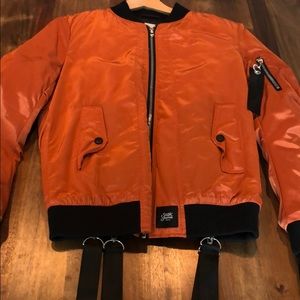 Bomber coat with strap details